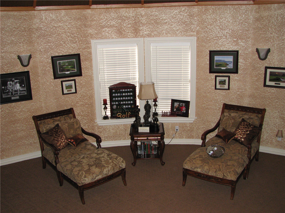 A Half Round Library With Faux Painted Walls