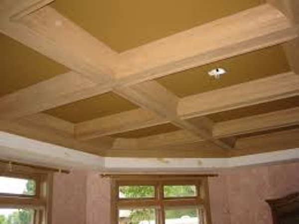 Contrasting beams and drywall ceiling