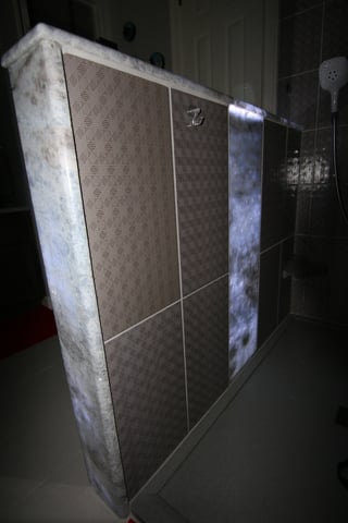 Custom Shower With Back Lit Onyx Panels In Austin